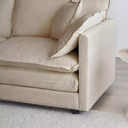 Sillón decorativo tapizado en crema, respaldo de almohada, para 1 persona