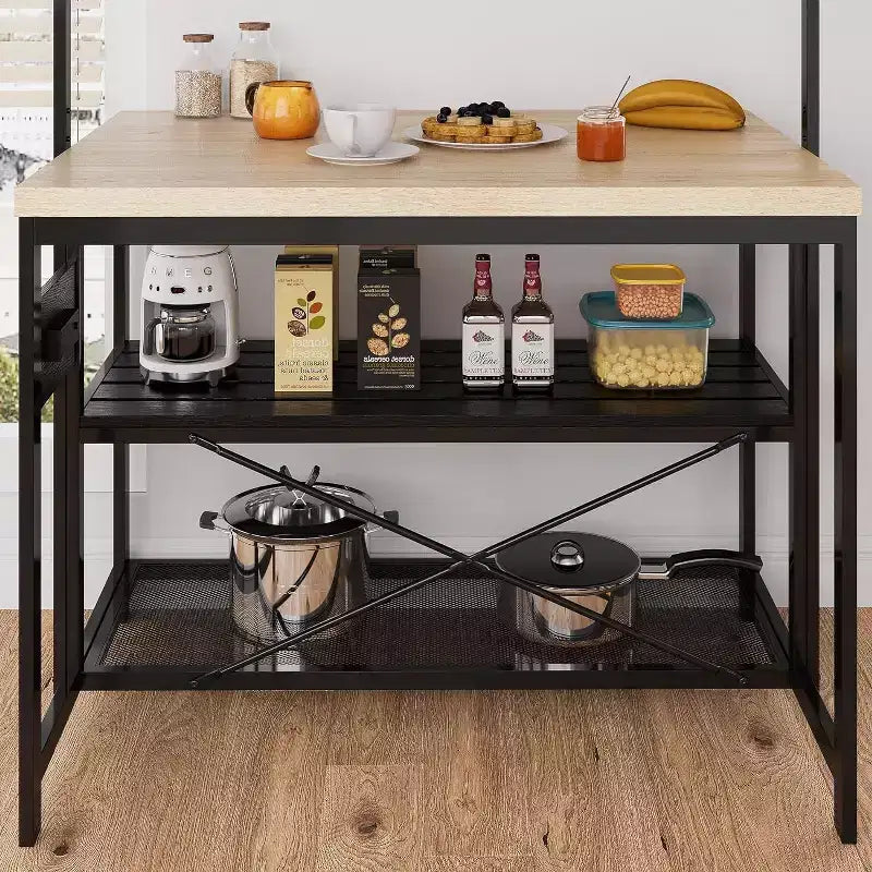 Mesa de isla de cocina de metal negro con estantes de 3 niveles y ganchos, con capacidad para 4 personas